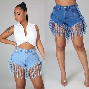 Distressed denim fringe shorts